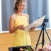 Angie Guttman Wedding Celebrant in a ceremony wearing a yellow shirt